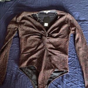 Large Charlotte Russe sparkly bodysuit. Never worn